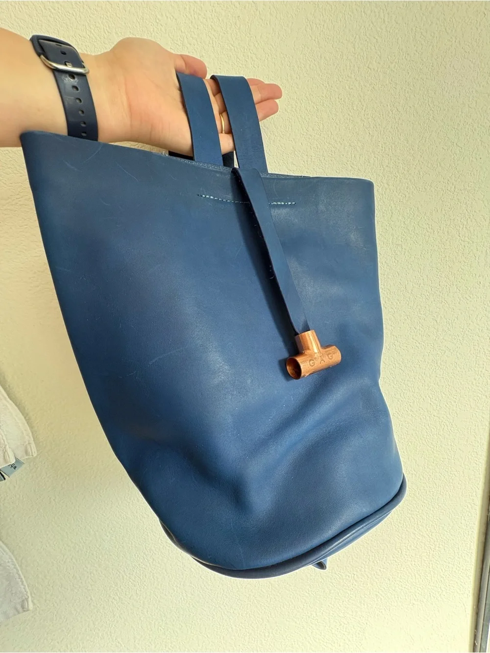 Structured Navy Leather Tote Backpack with Copper Accent